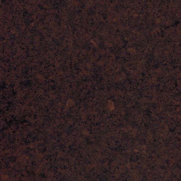 A dark brown cork floor set against a bank of hanging greenery and a wooden chair. The cork planks are made of thick 100% cork 