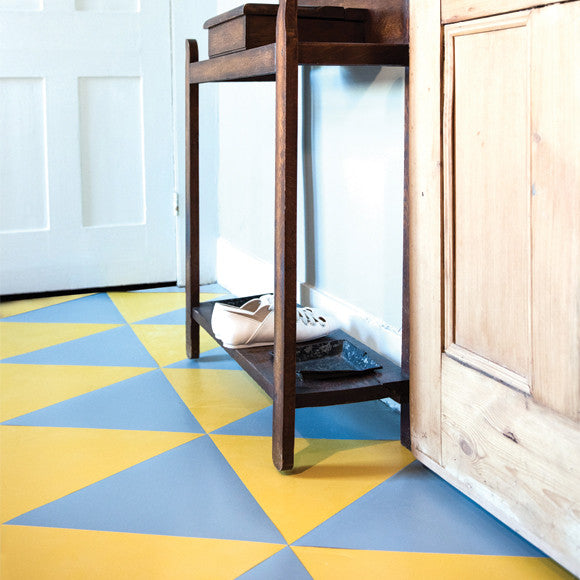 Yellow triangle-shaped rubber floor tile