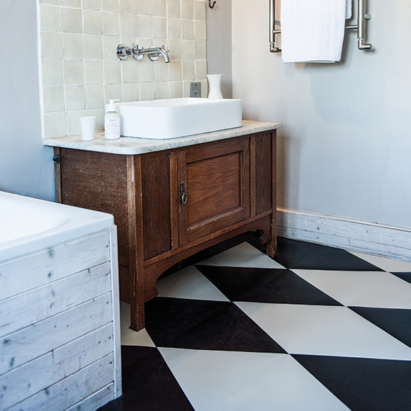 Rubber bathroom flooring in triangle tiles